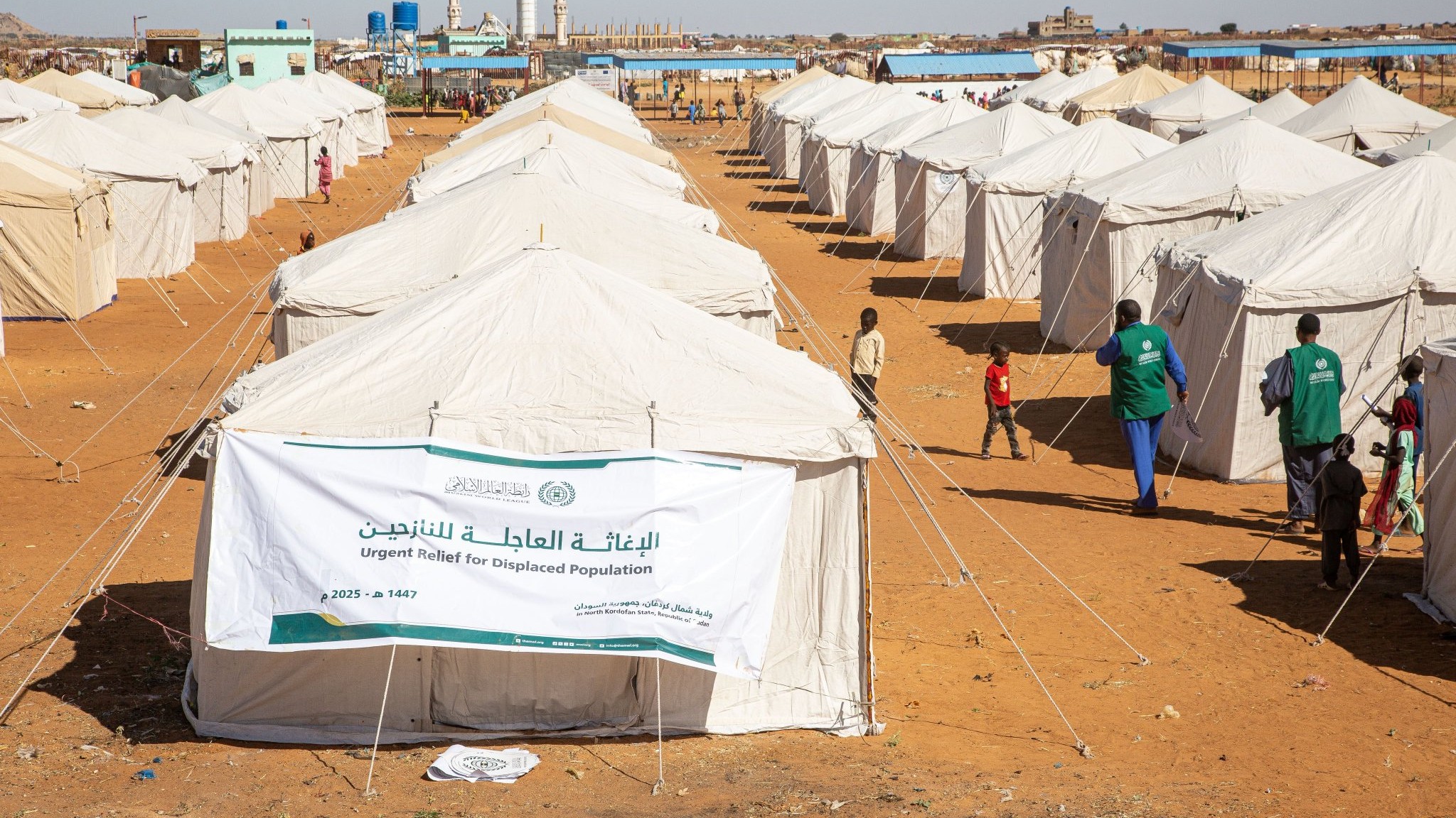The Muslim World League continues to distribute aid in North Kordofan State, Sudan, to displaced persons fleeing the ravages of war in the city of El Obeid