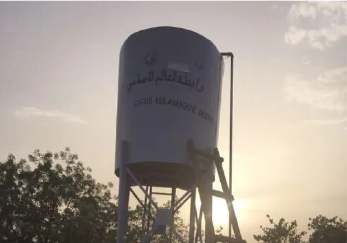 The MWL implements charitable projects in African villages. Wells are pumped using solar panels instead of customary methods to save costs.