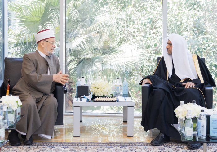 H.E. Dr. Mohammad Alissa receives His Eminence Dr. Ahmed Al-Taha, head of the Iraqi Fiqh Council