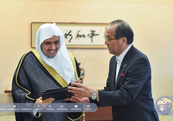 The Mayor of Hiroshima meets HE MWL SC Dr. Alissa & submits His Excellency's credential record at"Org. of World Peace" in Hiroshima.