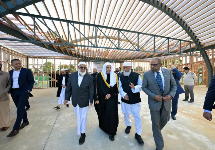 H.E. Sheikh Dr. Mohammed Al-Issa , Secretary-General of the MWL, toured the site where the first phase of the Islamic Centre is being developed in Auckland and took part in planting the Olive Tree of Peace within the centre’s premises