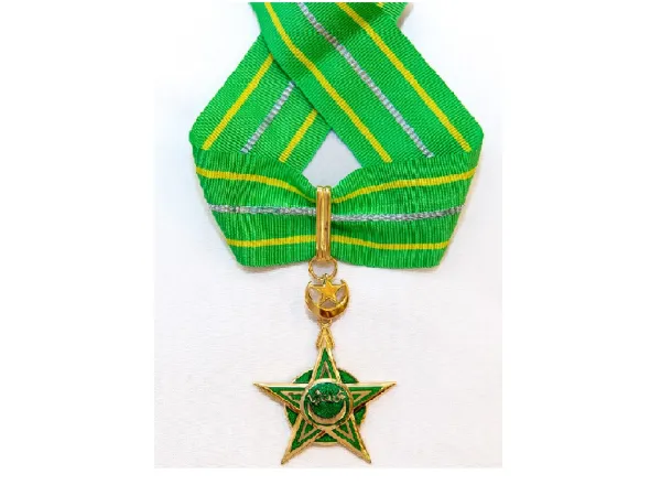 In a great ceremony attended by ministers: the Mauritanian president awards Sheikh Dr. Al-Issa the National Order of Merit for his international efforts in clarifying the true image of Islam